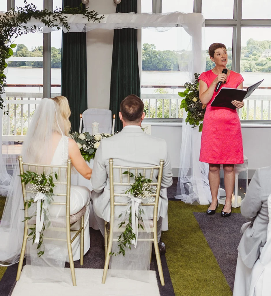 Rosemary Hartigan telling the couple’s love story at a riverside ceremony in Ferrycarrig, Wexford