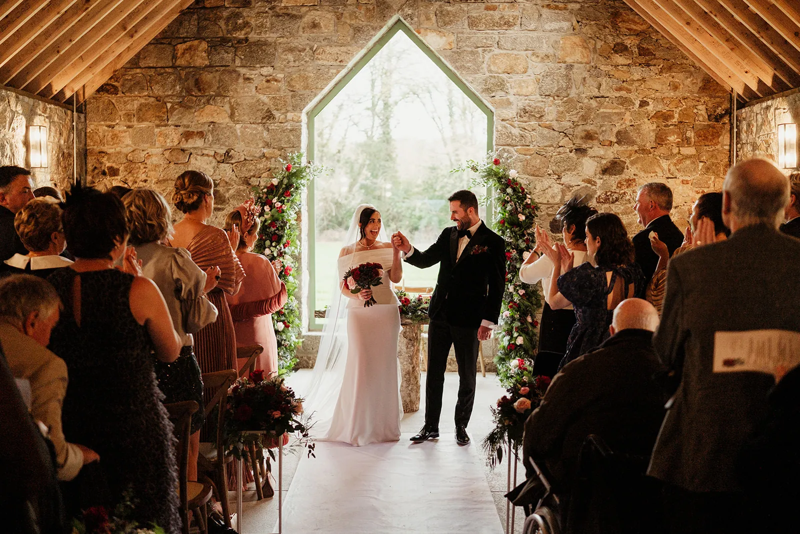 Aine and Patrick celebrating with their guests at Ballykealey House
