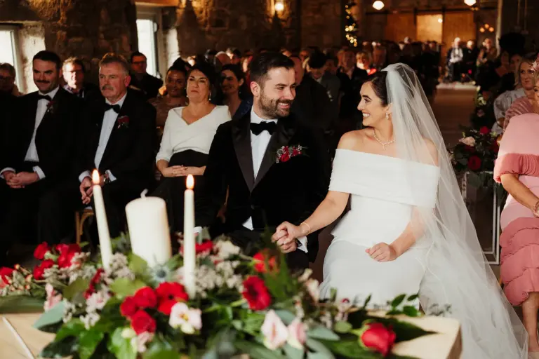 Aine and Patrick during their wedding ceremony at Ballykealey House