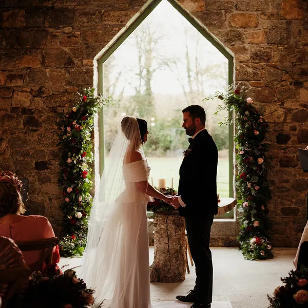 Aine and Patrick during their winter wedding ceremony at Ballykealey House