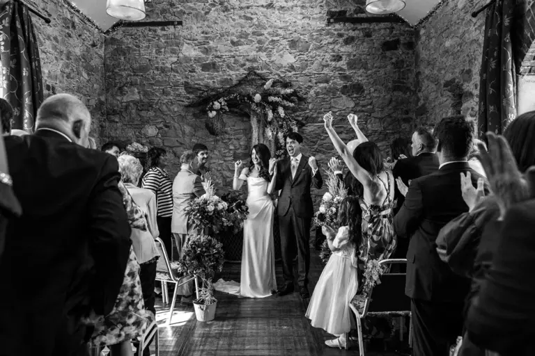 Aoife and Conor exchanging vows at Murphys Barn in Wexford