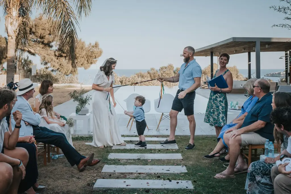 A handfasting ceremony at a destination wedding in Rhodes